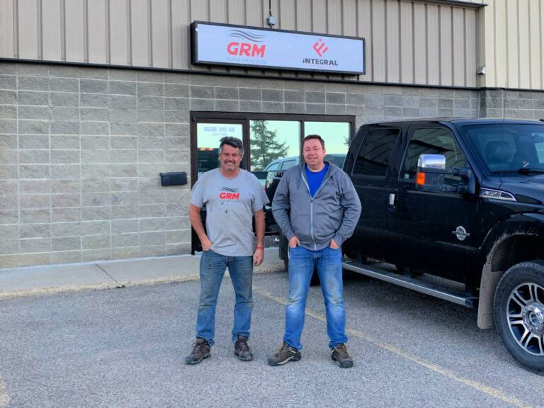 Stu & Greg in front of IFE / GRM Grande Prairie Sign